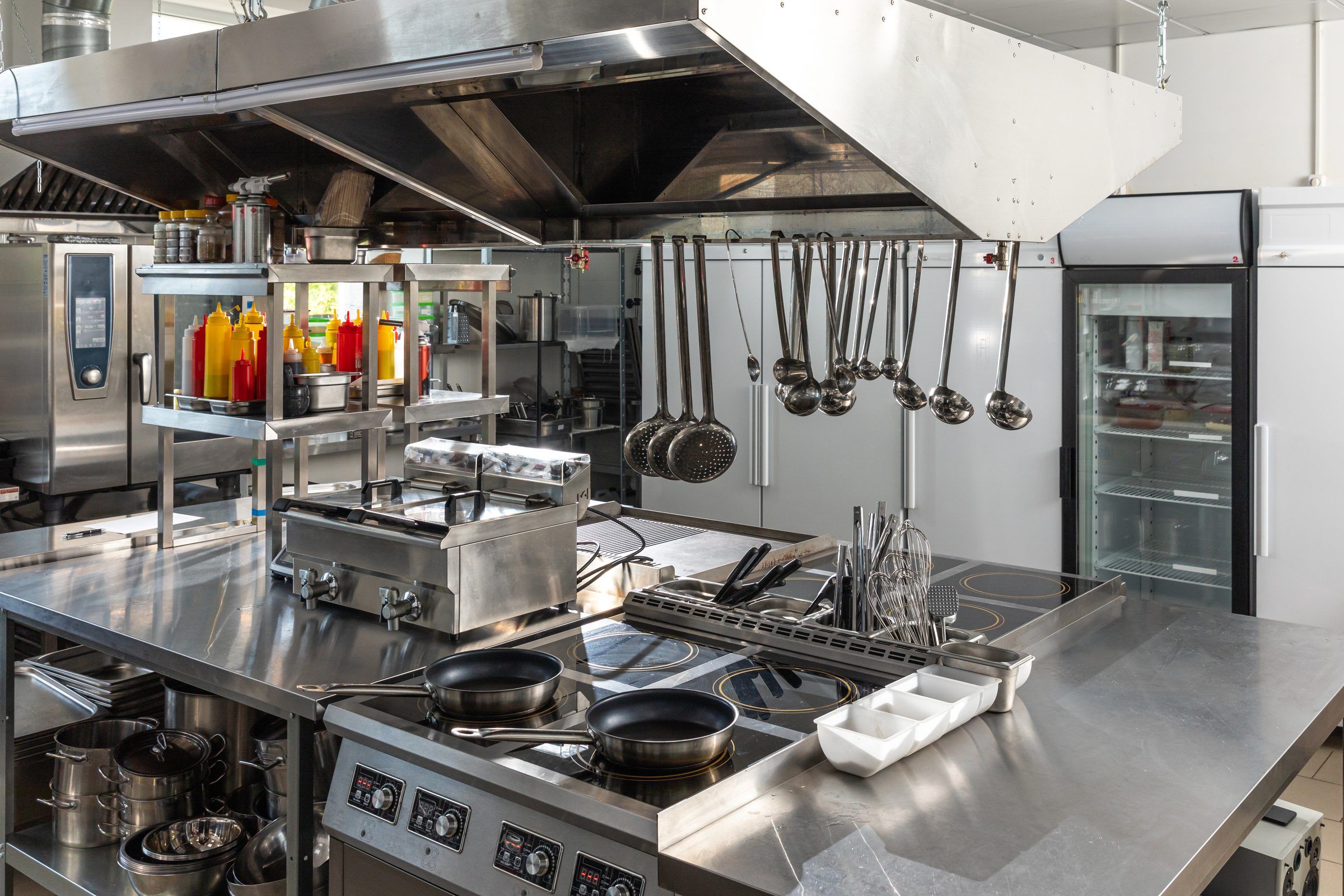 A stainless steel commercial kitchen line
