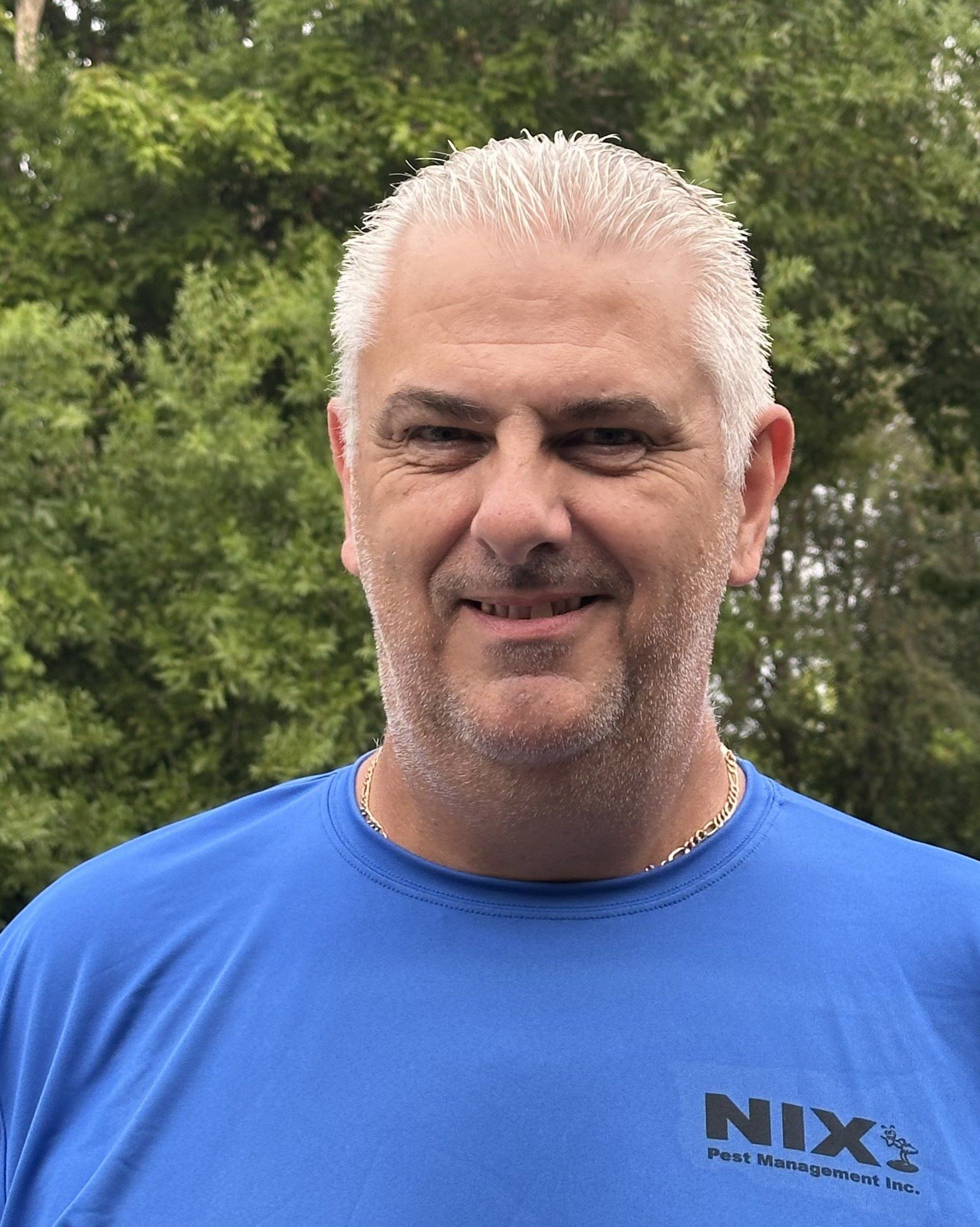 Simon Dixon, Nix technician, in a blue Nix Pest Management shirt